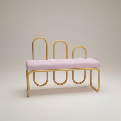 Gardenia Furniture Alya bench with gold aluminum frame and light pink linen cushion. Elegant, minimalist design for indoor or outdoor use.