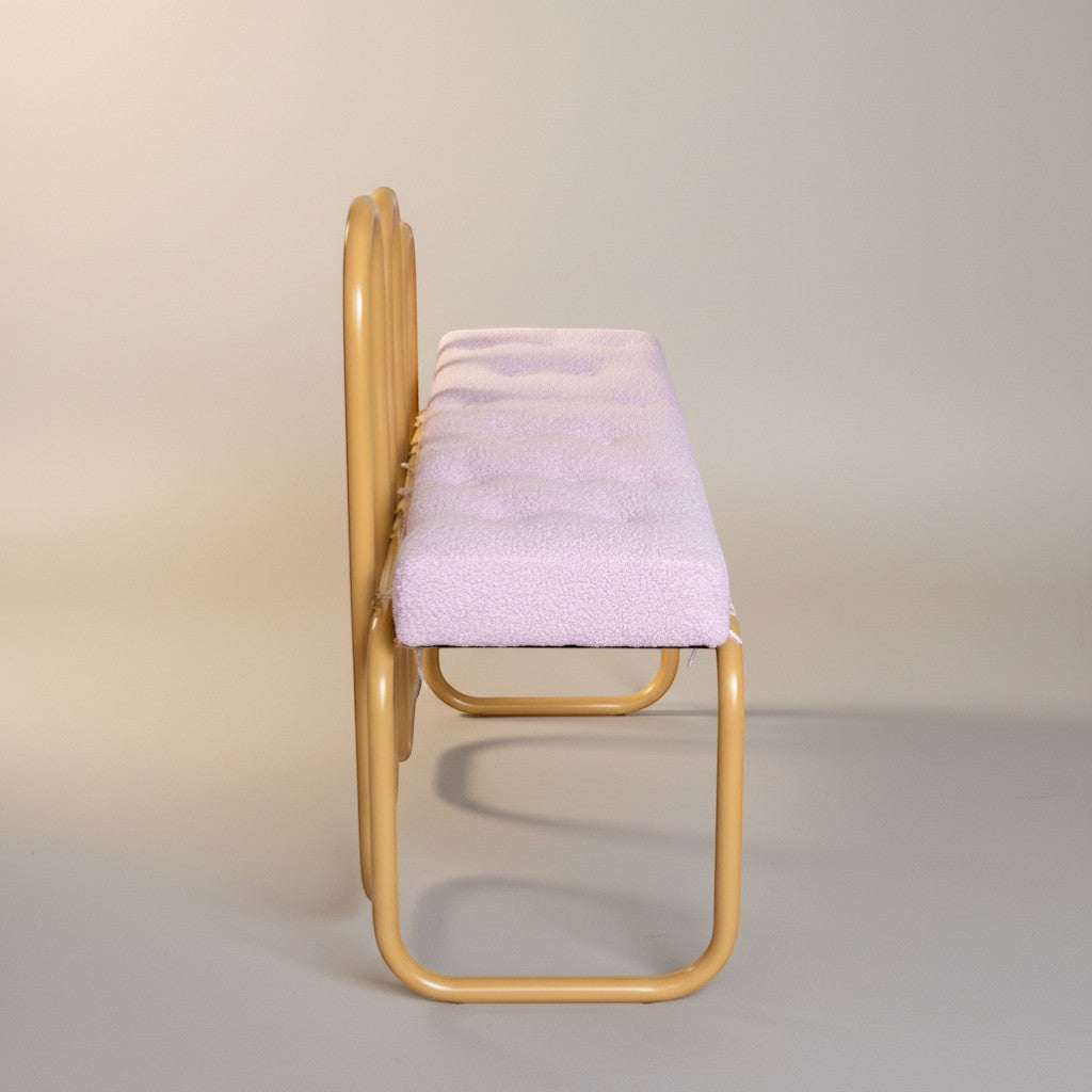 Gardenia Furniture Alya bench with gold aluminum frame and light pink boucle cushion. Tufted seat, elegant design.