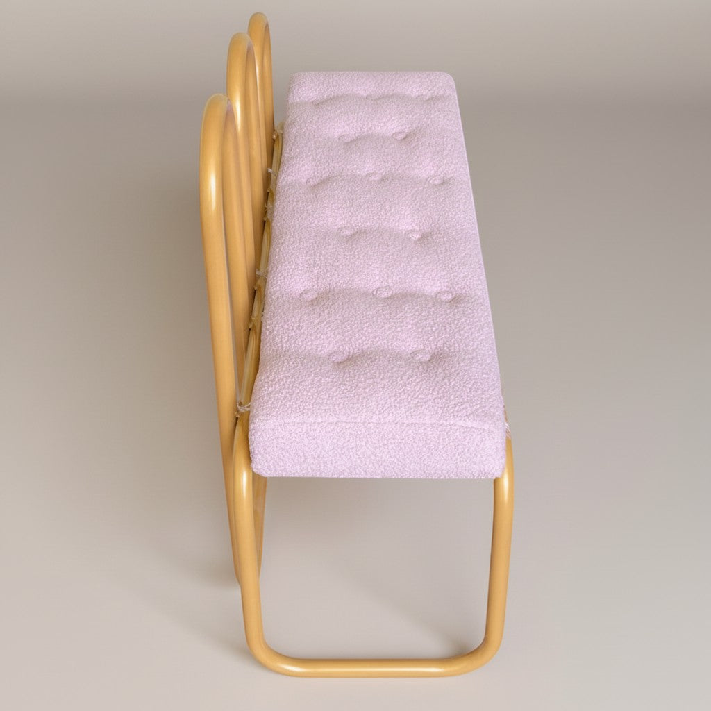 Gardenia Furniture Alya bench with gold aluminum frame and light pink boucle cushion. Tufted seat for comfort.