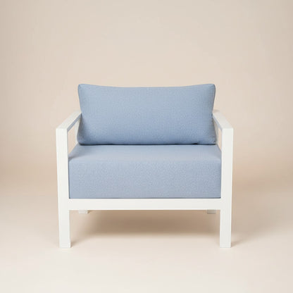 Gardenia Furniture Arco Lounge Chair in light blue textured fabric with white aluminum frame. Modern minimalist design.