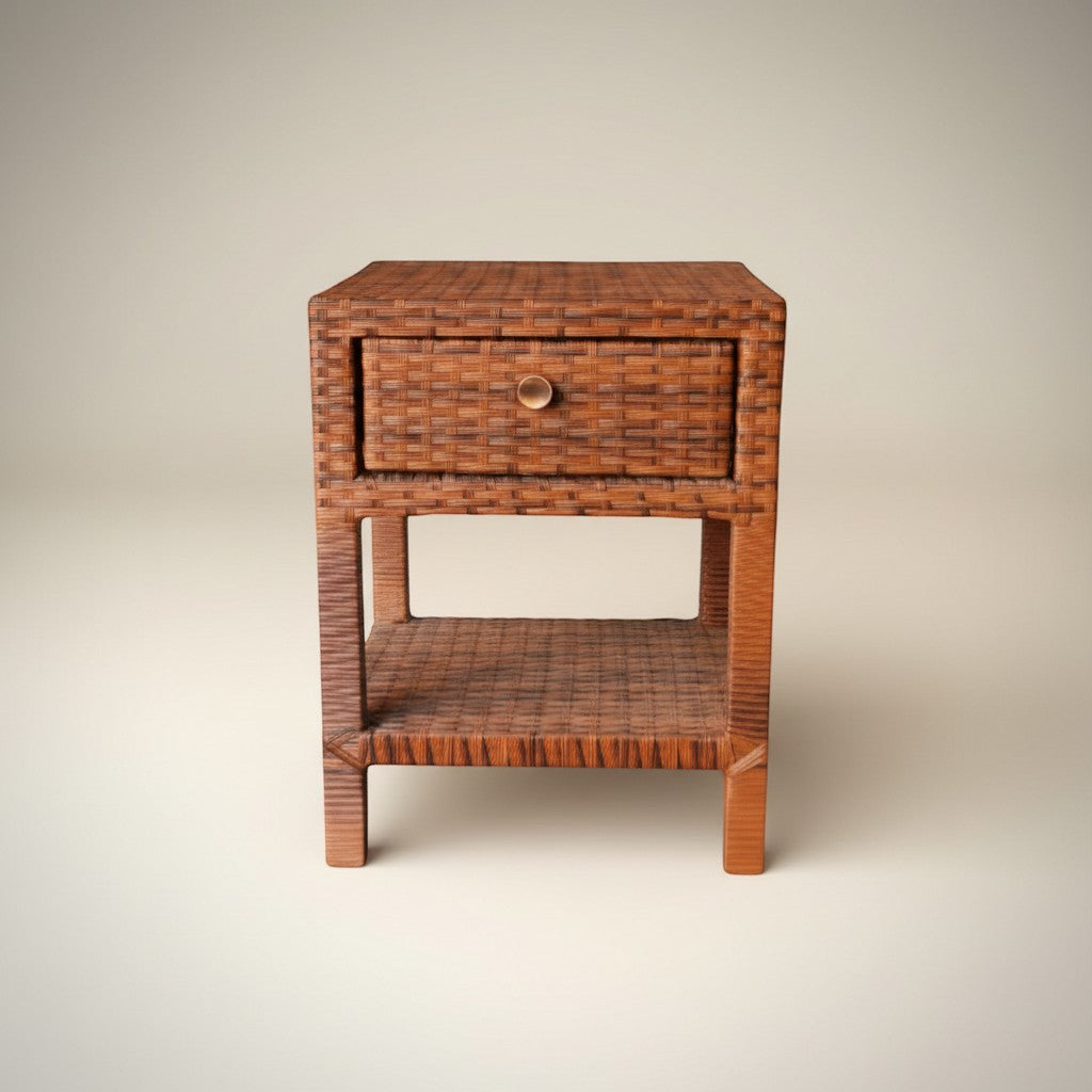 Gardenia Furniture brown synthetic rattan nightstand with one drawer and open shelf. Natural woven texture.