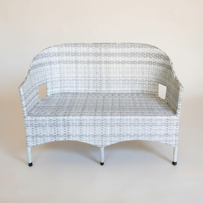Gardenia Furniture grey and white rattan 2-seater outdoor sofa with steel frame and cut-out armrests.