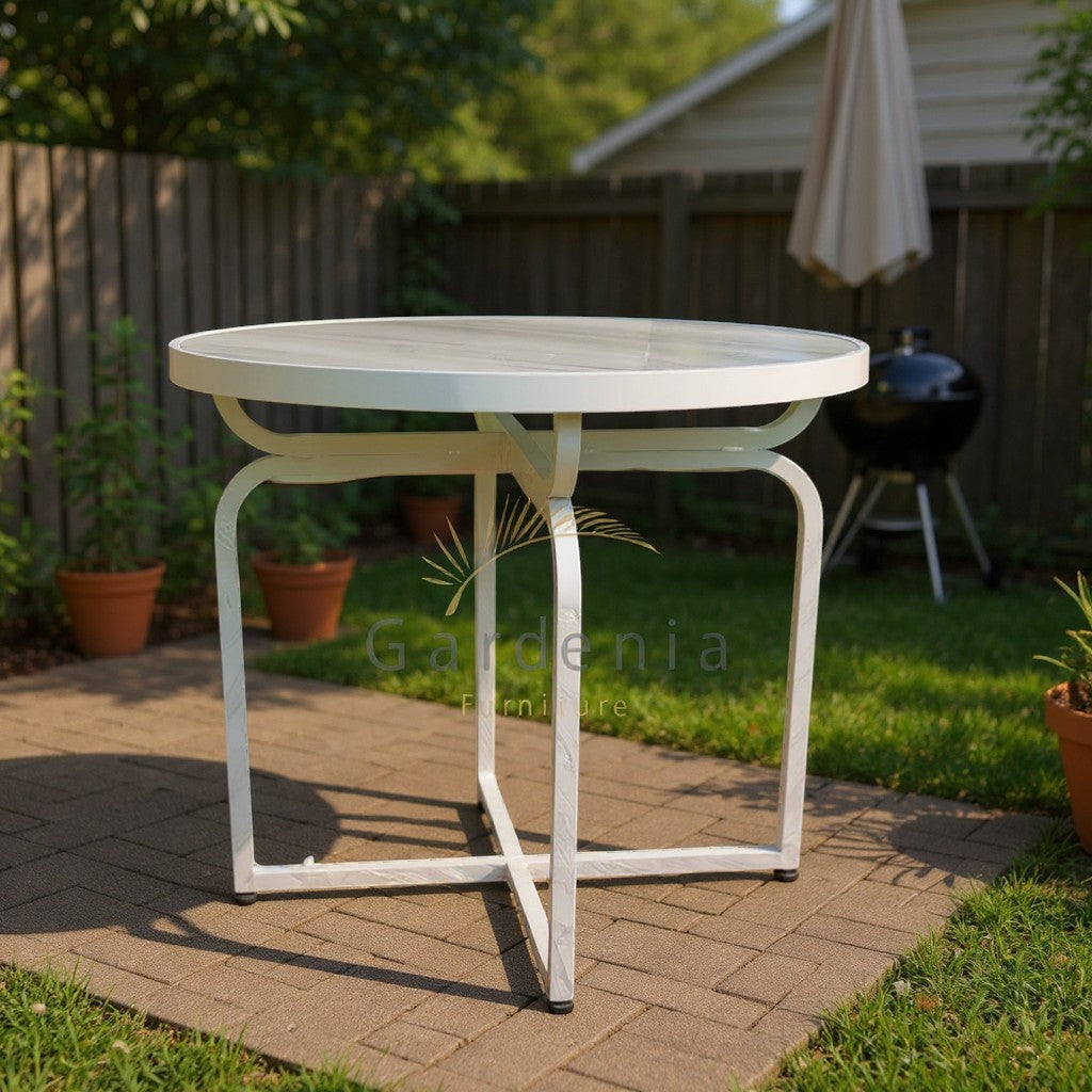 Gardenia Furniture round Carrara marble tabletop with white aluminum frame, ideal for outdoor use.