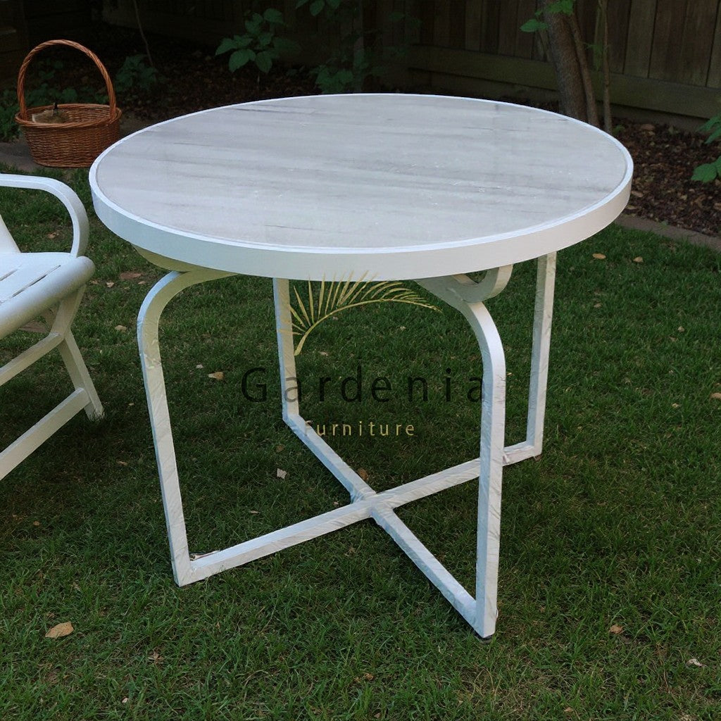 Gardenia Furniture round marble top table with white aluminum frame, ideal for outdoor dining.