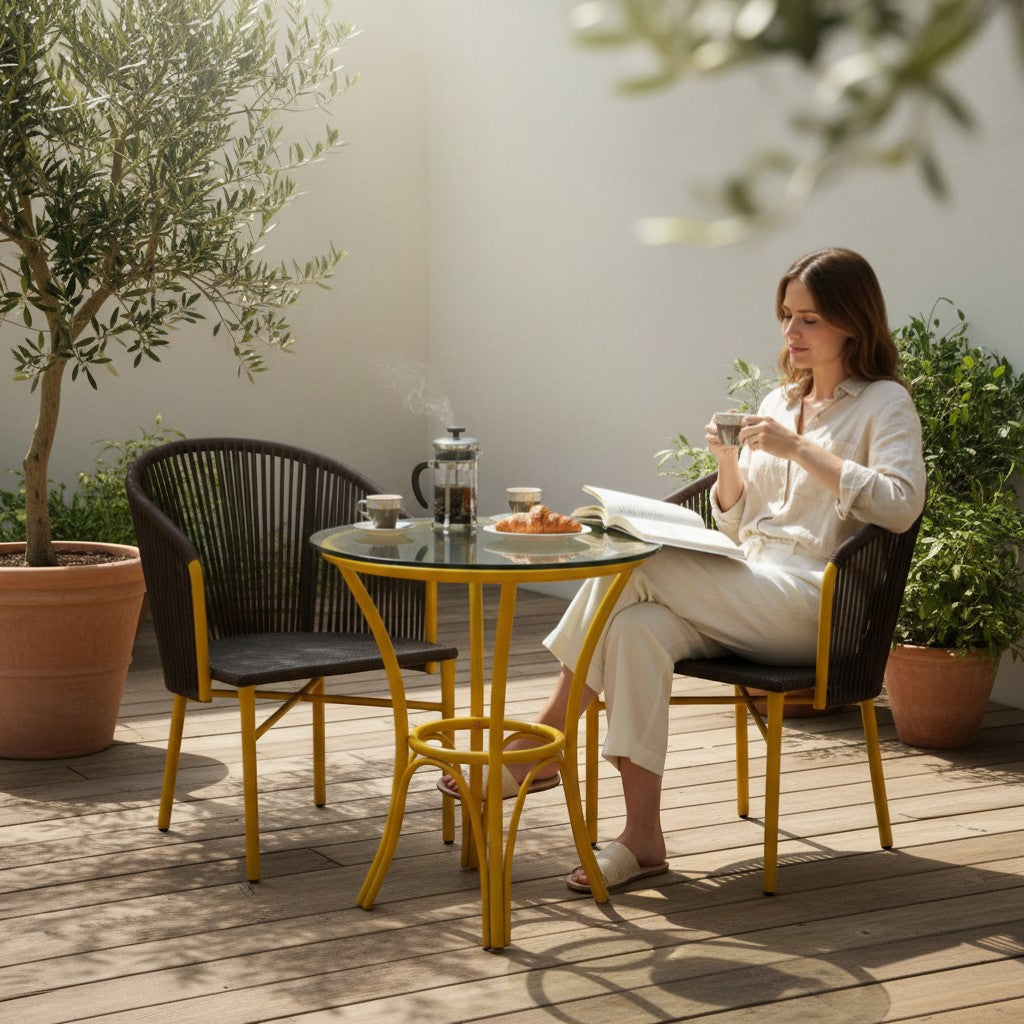 Gardenia Furniture Sumer Set: 2 chairs with dark rope backs, PVC mesh seats, and yellow steel frames, plus a glass-top table with a yellow base. Ideal for patios.